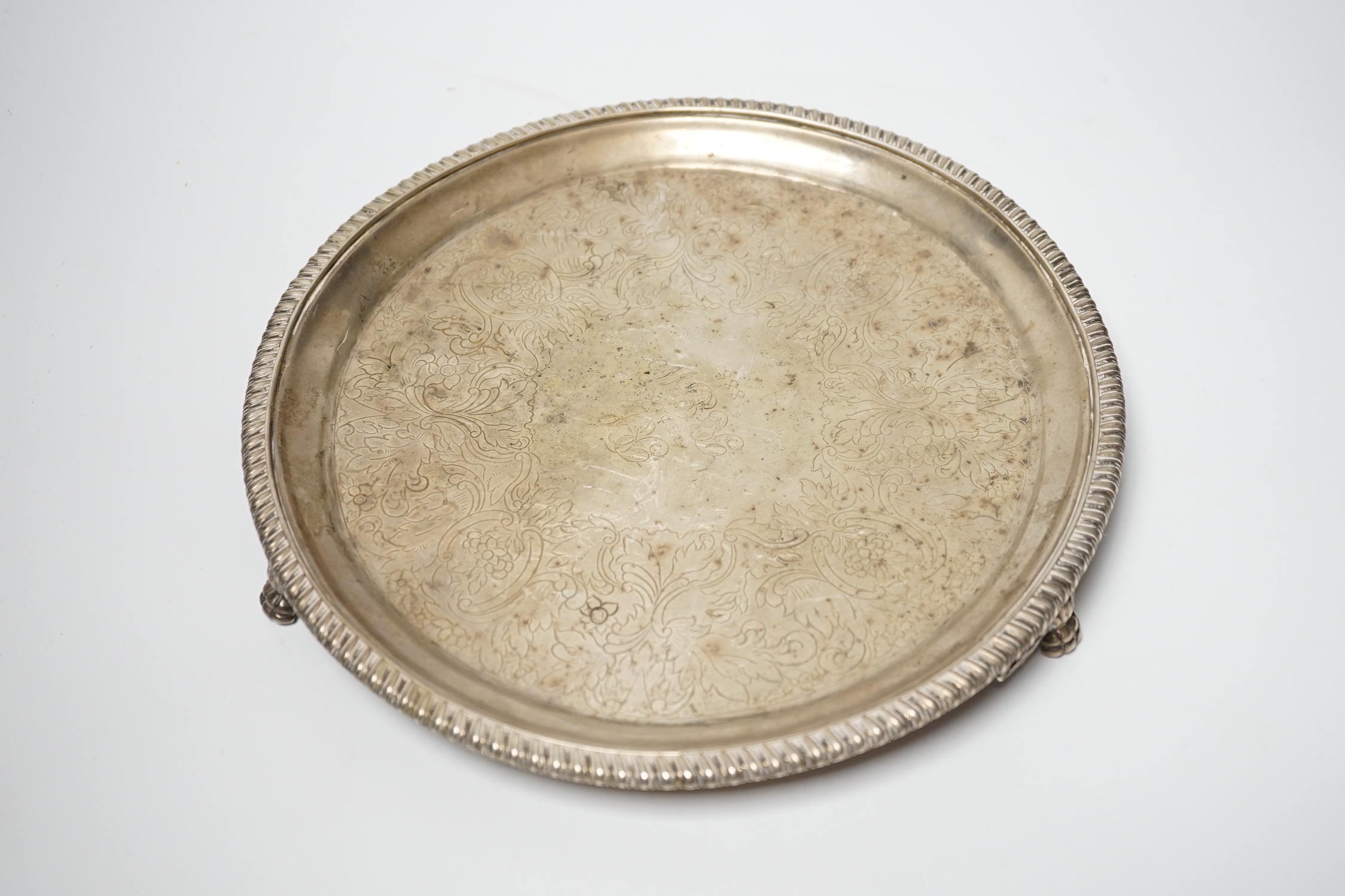 A George IV Scottish engraved silver circular salver, Mitchell & Sons, Glasgow, 1821, (centre gauge very thin), 24.9cm, 17.8oz.